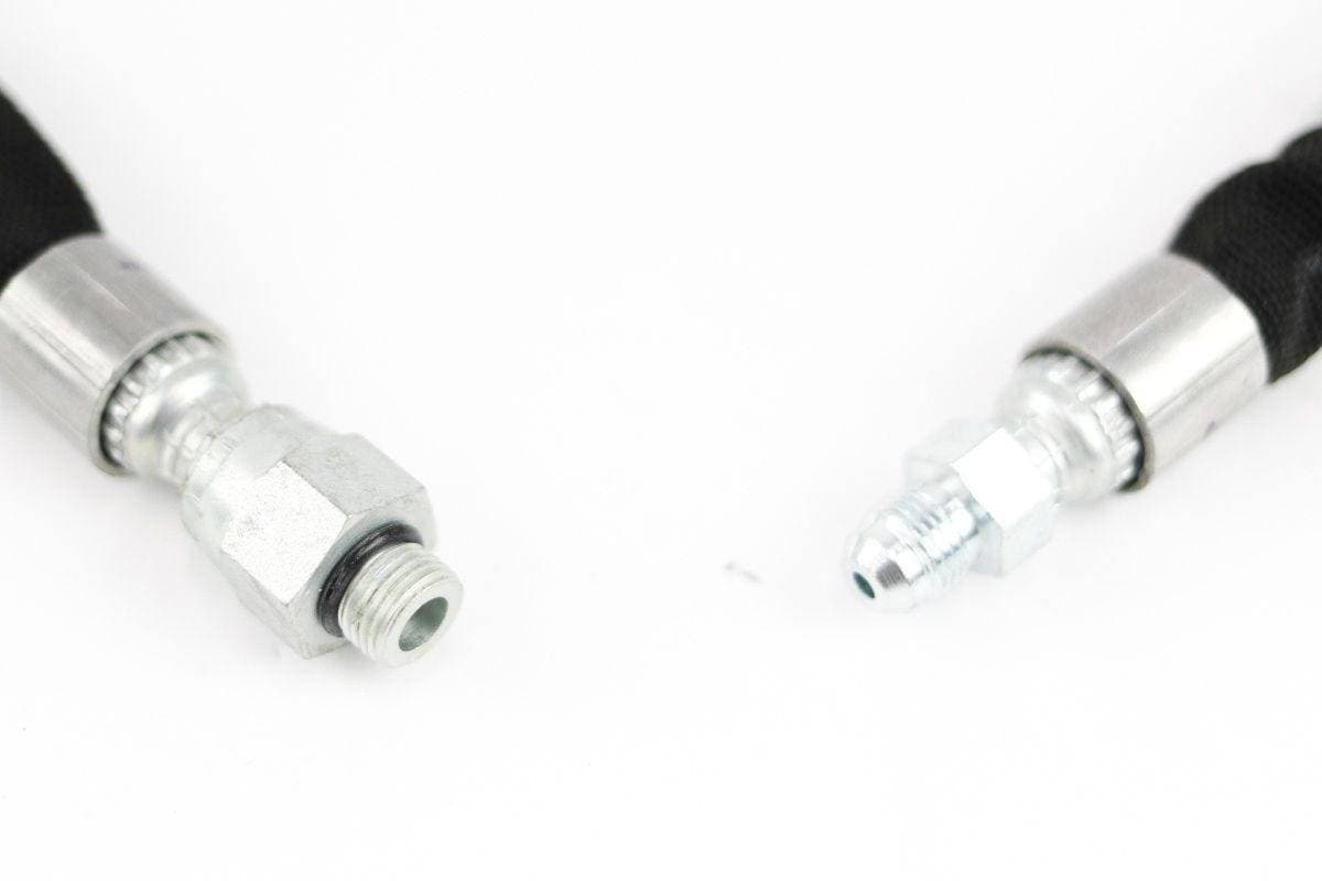 Genuine Bobcat Hydraulic Hose 7387612 showing close up of hose ends.