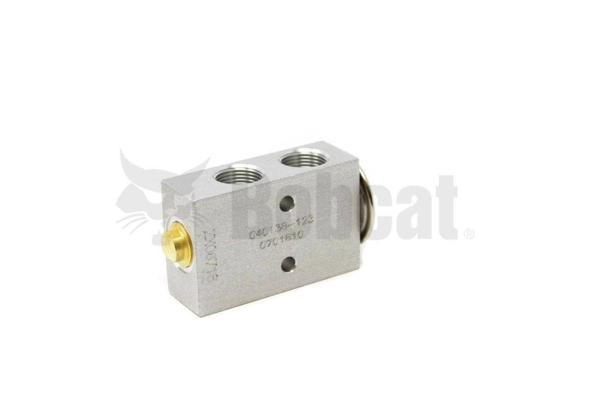 Genuine Bobcat AC Valve Block, 6675534 side view with gold end. 