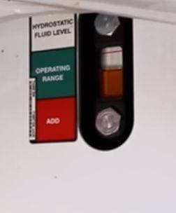 Genuine Bobcat Sight Gauge, 7001421 shown installed on a machine.