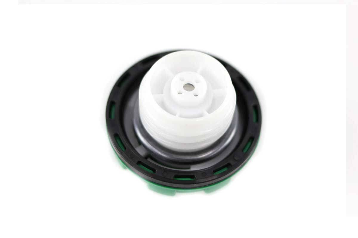 Genuine Bobcat Locking Fuel Cap, Green, 6661696 showing the threaded end.