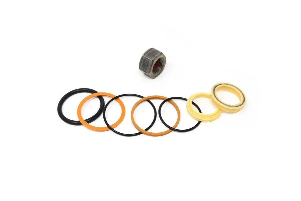 Genuine Bobcat Cylinder Seal Kit, 7137786 showing piston seal, rod seal, wiper rod seal, nut, and o-rings included in the kit.