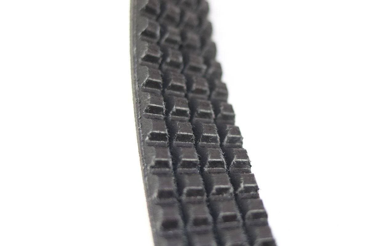 Genuine Bobcat drive belt 7177671 showing close up of cogged groves.