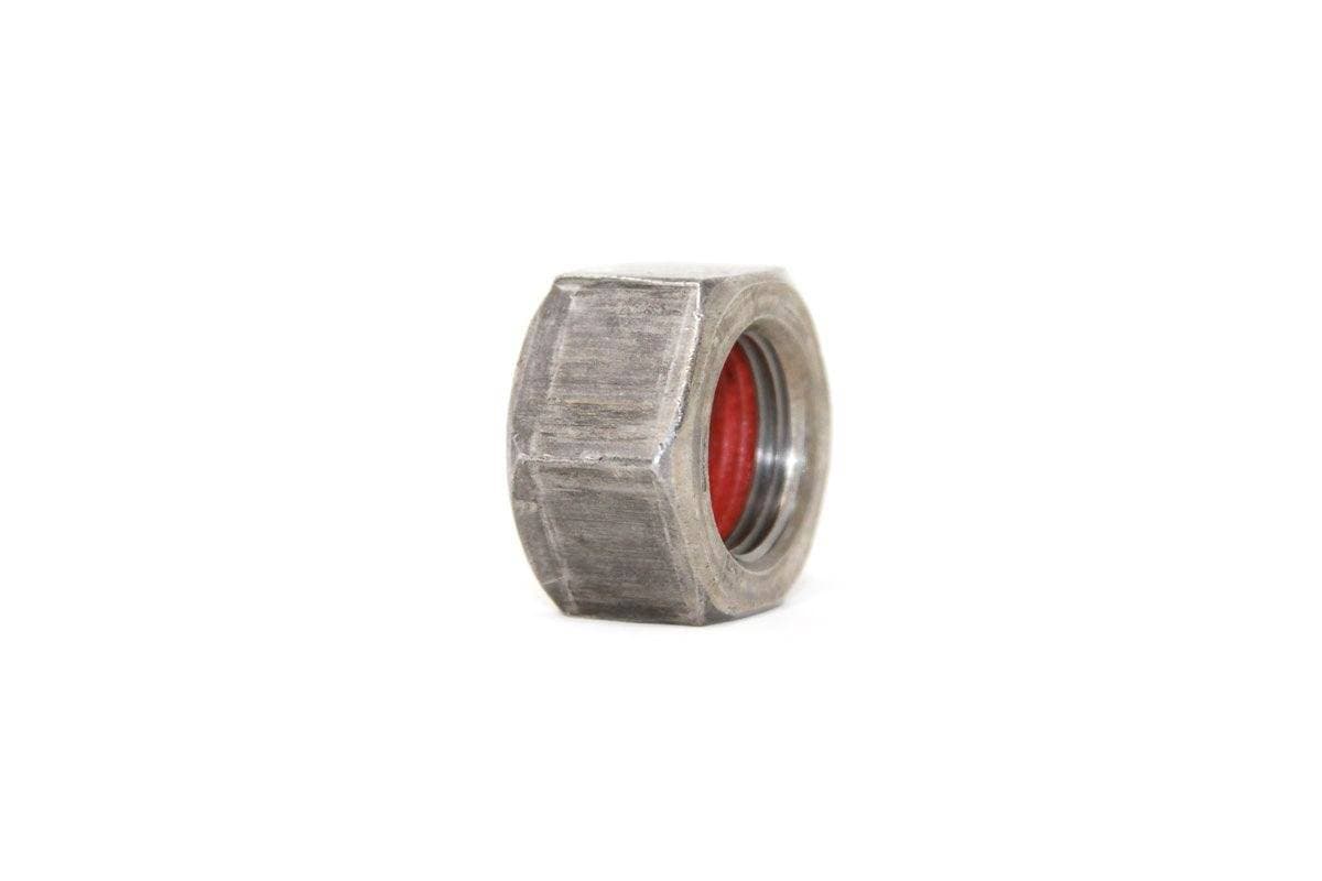 Genuine Bobcat Cylinder Seal Kit, 7137786 showing the nut included in the kit with pre-applied threadlocker.